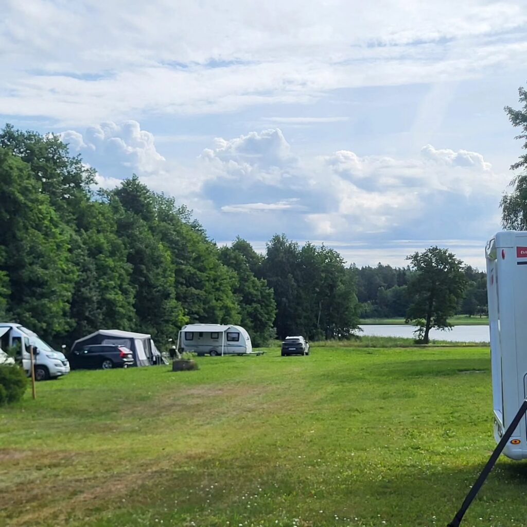 Några av våra campingtomter, med Väddöviken i bakgrunden.